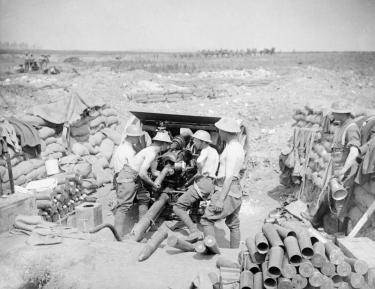  Battle of Pozieres Ridge 23 July - 3 September: An 18 pounder gun, its crew stripped to the waist in the sunshine, putting over curtain fire from the Carnoy Valley near Montauban. Battle of Pozieres Ridge. 18 pdr. Putting over curtain fire or barrage. Carnoy Valley, near Montauban. 30 July 1916.Q 4066 